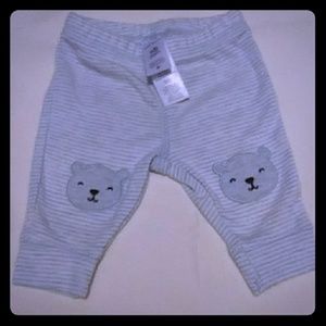 Light blue striped pants with animal face